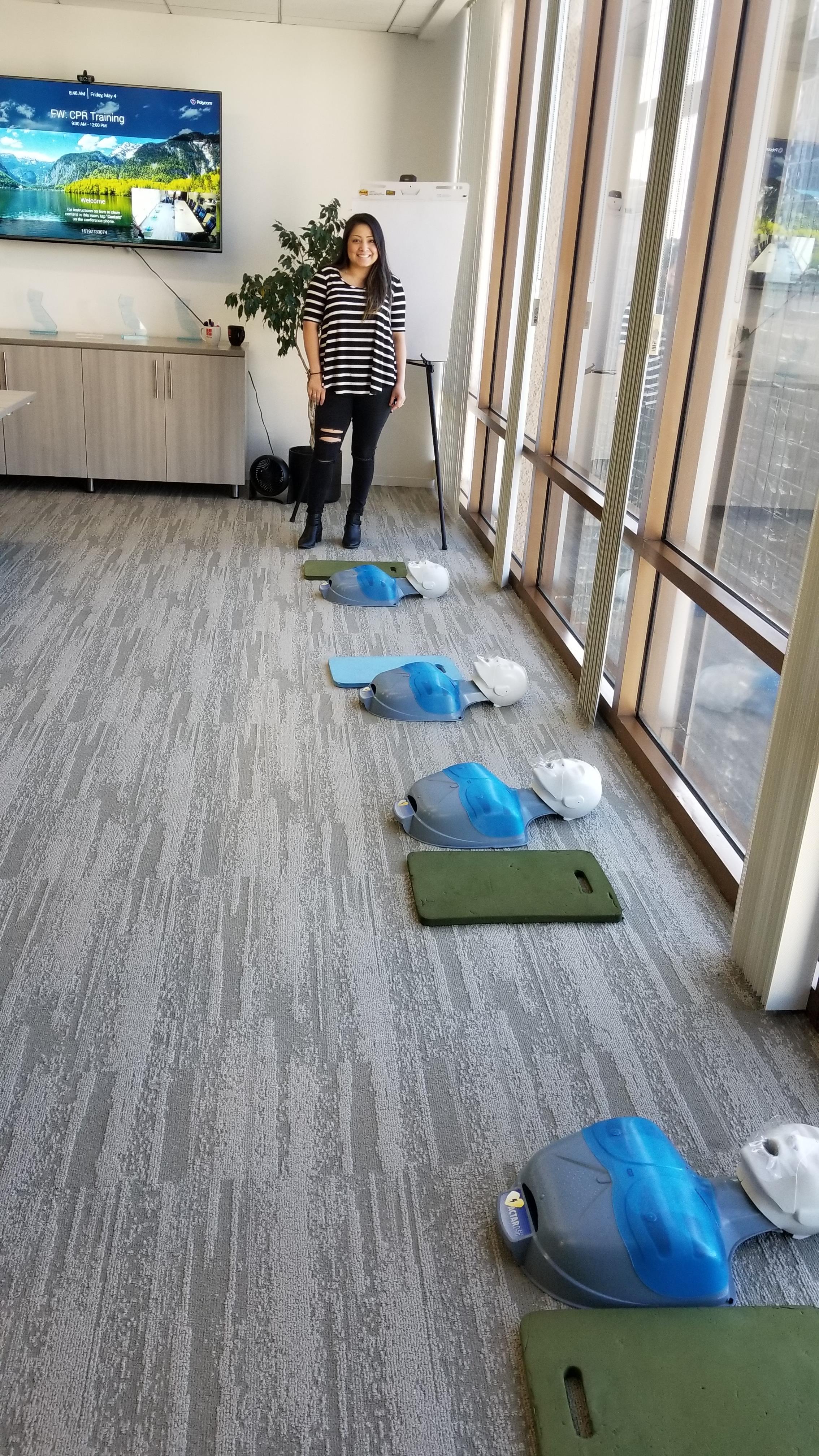 Harris employee setting up for CPR/AED training.